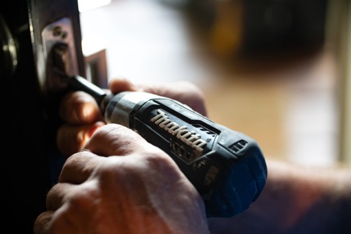 Handyman Services: selective focus photography blue and black Makita power drill